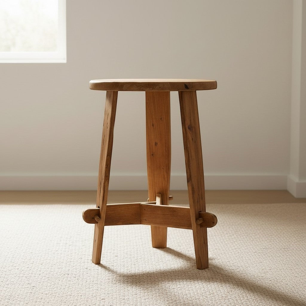 CRUSOË Rembrandt recycled teak side table with visible dowels and a natural wood finish, shown in a living room setting.