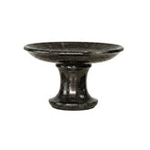 CRUSOË black marble pedestal cake stand with a round top and a flared base. Ideal for serving desserts or displaying decor.
