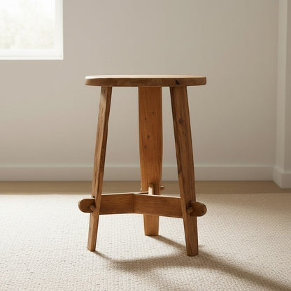 CRUSOË Rembrandt recycled teak side table with visible dowels and a natural wood finish, shown in a living room setting.